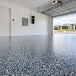 Decorative flake epoxy flooring installed in a Gold Coast residential garage, finished with a Colour Flake® blend over a coloured basecoat