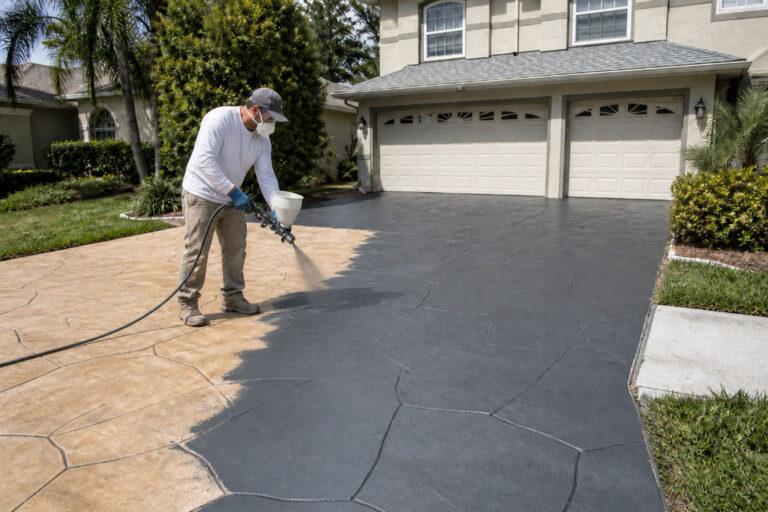 Resurfaced stamped concrete driveway on a Gold Coast home, refreshed with a covercrete overlay